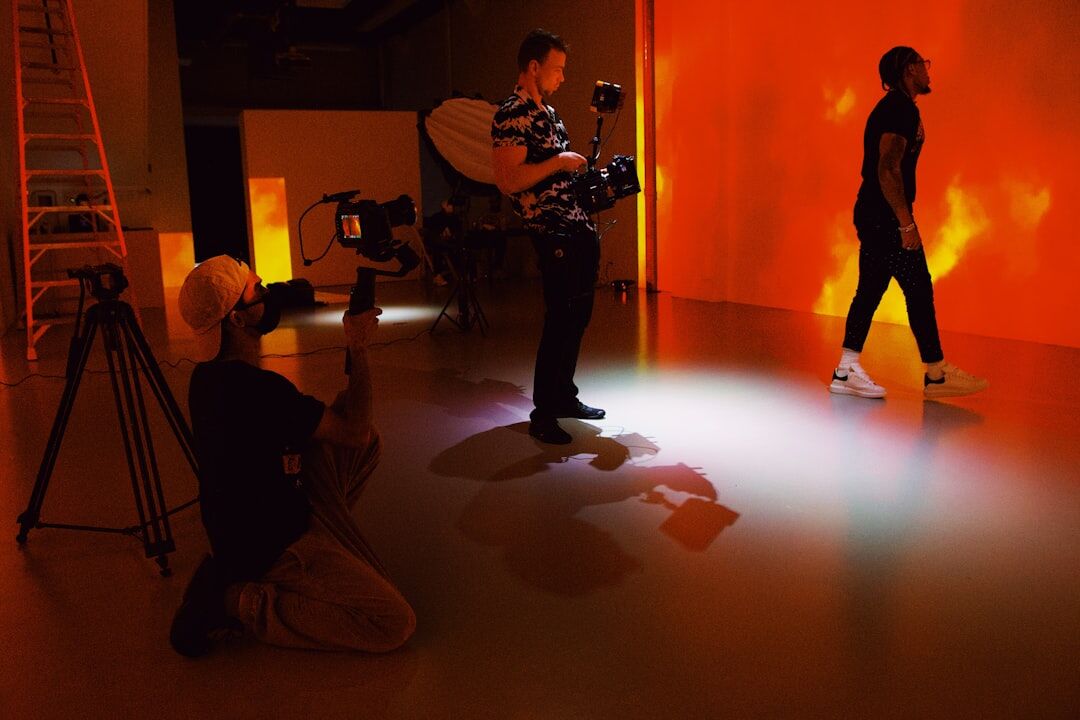 Group of Finnish broadcast production trainers standing together in a television studio