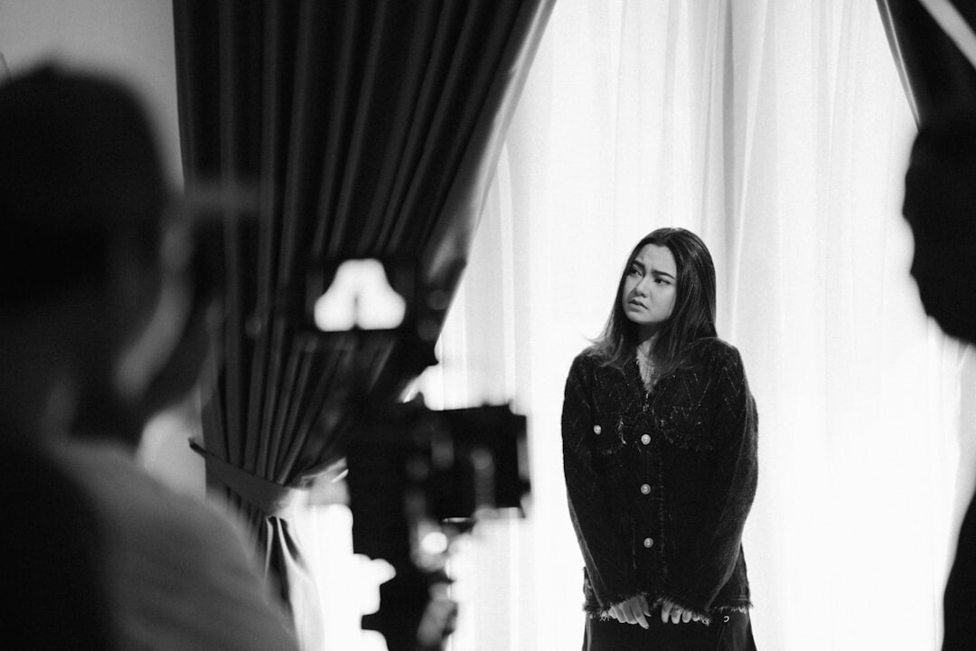 Finnish female television presenter speaking on set during a live broadcast