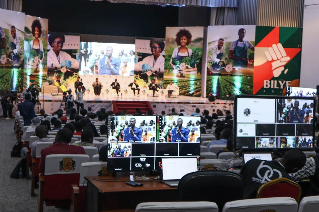 Wall of monitors displaying live streaming production feeds in a broadcast facility